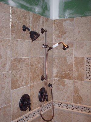 New shower tile and hardware installed by Affordable Remodeling and Repair