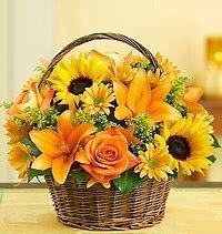 Sunflowers Orange liles, Orange roses and daisies in basket