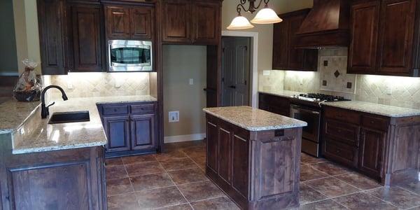 Granite countertops, custom cabinetry, and spacious floor plans make our kitchens the best in the Haughton area.