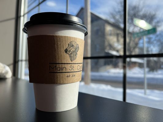 Cinnamon coconut latte at their window counter seating.