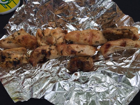 Two skewers of grilled chicken kebab- cooked perfectly