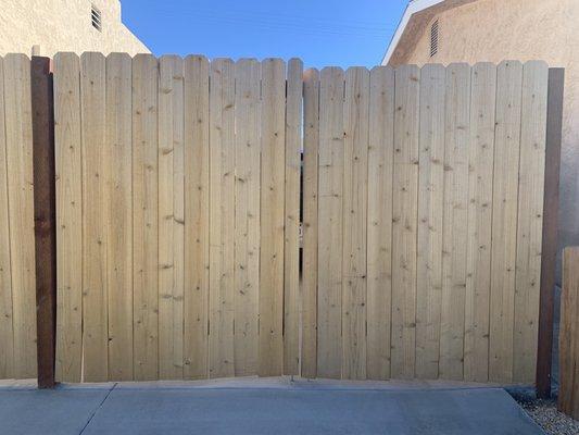 Fence gate installed by Calderon's landscape. Doesn't close, heights don't match. Looks terrible.