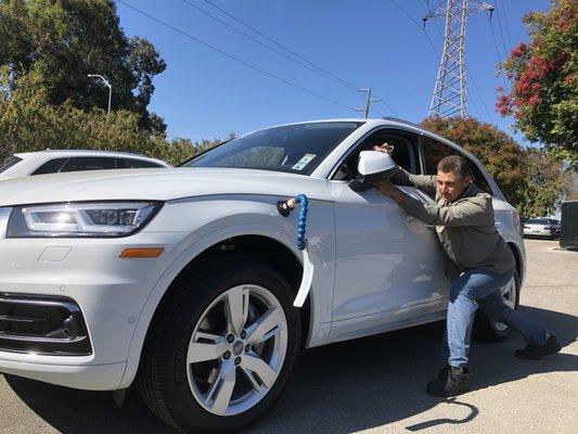 Repairing a door ding on a 2018 Audi Q5