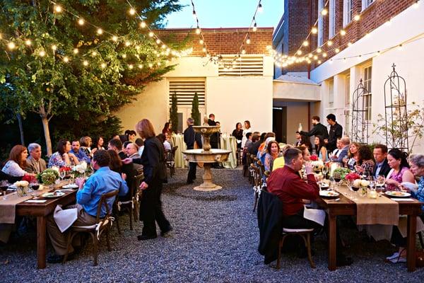 The Garden Courtyard, an oasis of greenery, string lights and even a carved stone fountain.