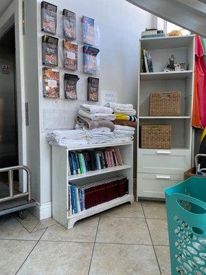 Their little book section for guest to enjoy a nice book on the beach or their roof top patio/balcony