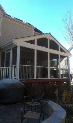 Beautiful screened in porch with powder coated aluminum rails & all wood covered with white PVC material...