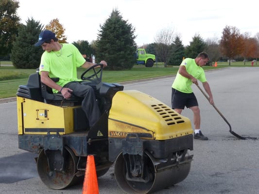 Repairing Asphalt, MUDTeCH  Repairs home, business, or municipal pavement.