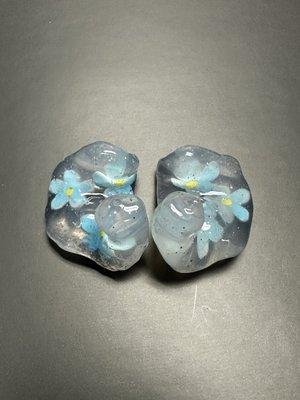 Beautiful, glass-like earplug designs for hearing protection...but it's really soft silicone.