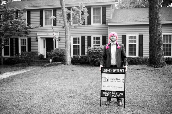 Wearing a pink wig at work, to raise money for breast cancer research.