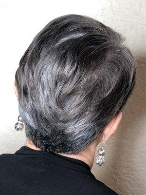 Longer pixie cut with silver fox color