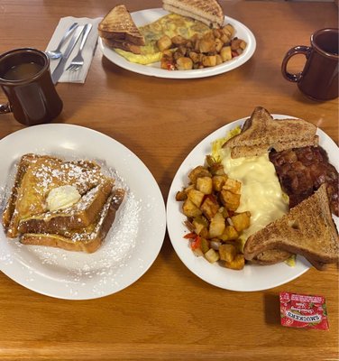 French toast, home fries, omelette, cheese eggs, bacon, and toast