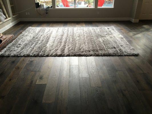 This is a rug Doug had bound for one of our projects. It looked great on top of the wood floor!