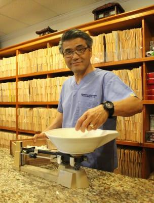 Making herbal teas is one of Dr. Chung's favorite parts of his profession.