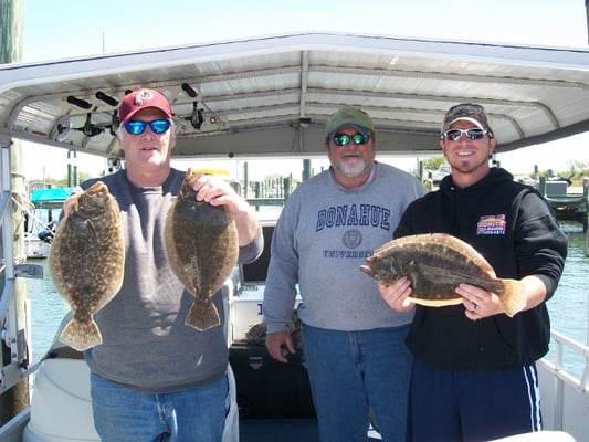 Three nice Flounder fishing with Captain Charlie