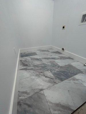 WE INSTALL SMART CORE TILE AND BASEBOARDS