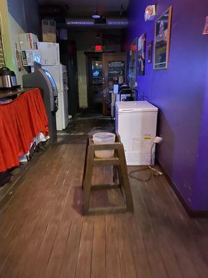 Bucket collecting water from the ceiling