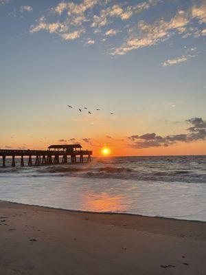 Watching the sunrise at Tybee Pier and pavilion