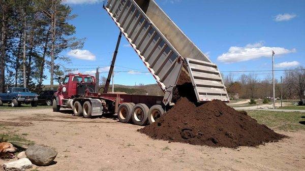 Aggregate material trucking