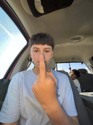 This kid flipped me off from their van