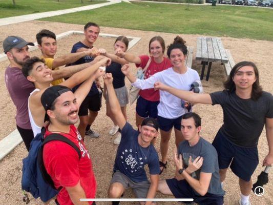 Young Adult Group playing sand volleyball!