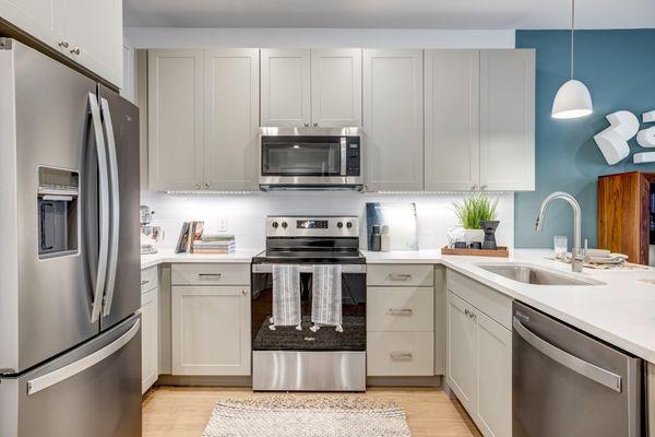 Luxury kitchen with granite countertops and stainless steel appliances