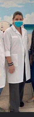 Looks like Sally Smith does indeed wear a lab coat. shame on your practice for employing her!