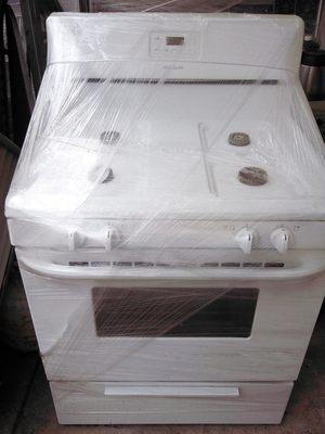 We move most items that customers need to bring to their new house, like this stove, wrapped and protected.