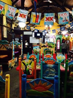 A super colourful interior with unique tables & chairs.