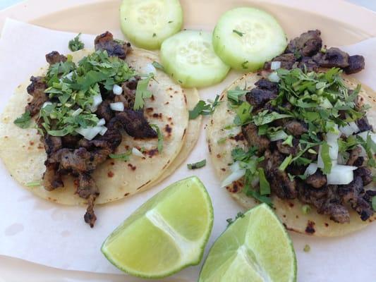 Steak taco's, onion & cilantro