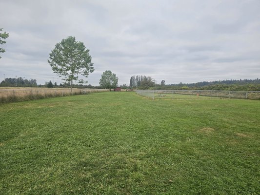 Separate smaller fenced in area inside larger fence.