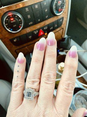 Pink Ombré nails.