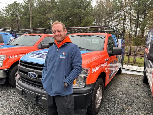 Tip Top Garage Doors Technician near Truck