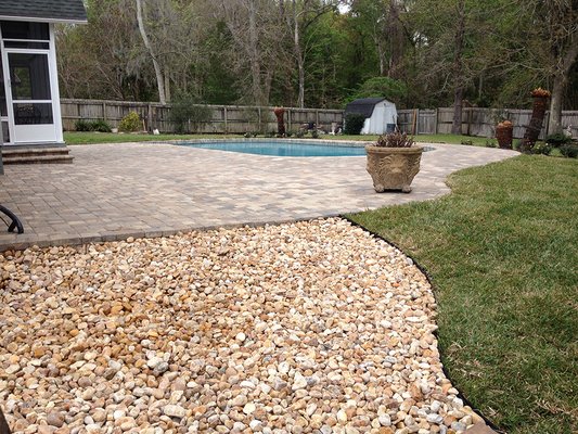 Patio stone pool deck & rock path; sod