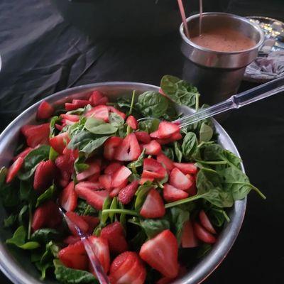 Strawberry spinach salad with our own house strawberry vinaigrette dressing