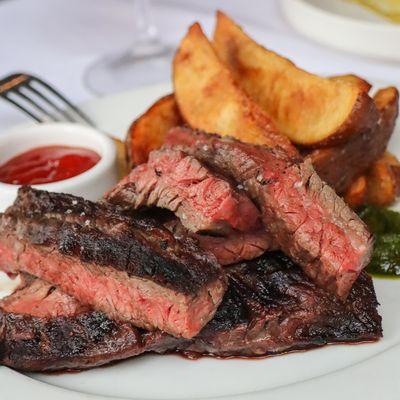 Skirt Steak Marinated in Garlic and Lemon with Crisp Russet Fries & Handmade Siracha Ketchup