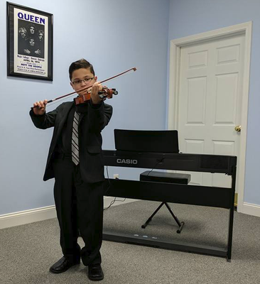 Student performing on violin