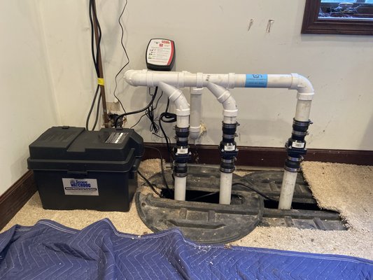 New Sump pumps and battery backup system.