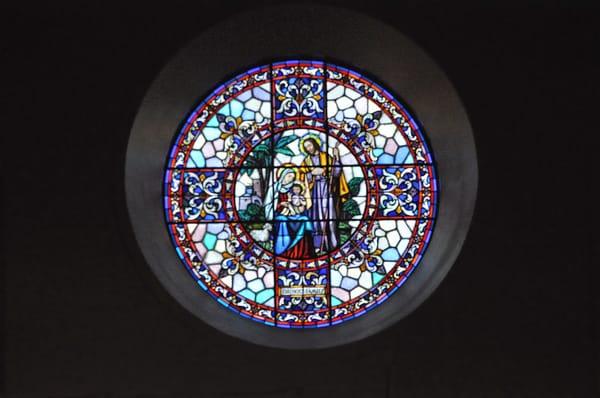 Rose window of The Holy Family. You have to come all the way in the temple, turn around and look up to see it for yourself.