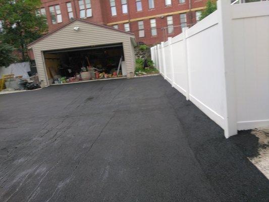 Driveway Pave and Vinyl Fence Installed