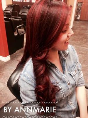 Bright red ombré with balayage highlights and long layered cut