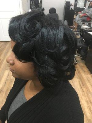 Press and Curl (click link to book your appointment today ! ) https://www.vagaro.com/ambermonnai