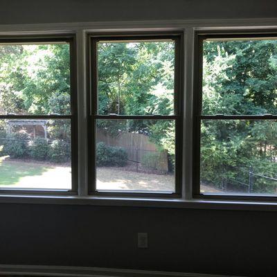 Upstairs three windows in bedroom facing out. New windows making it cooler inside during the day