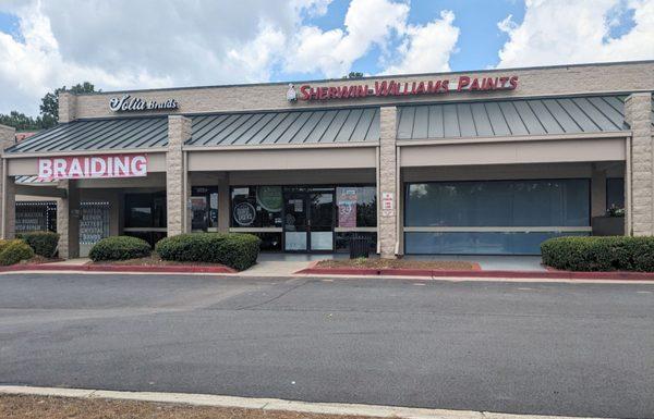 Sherwin Williams and the neighboring store.