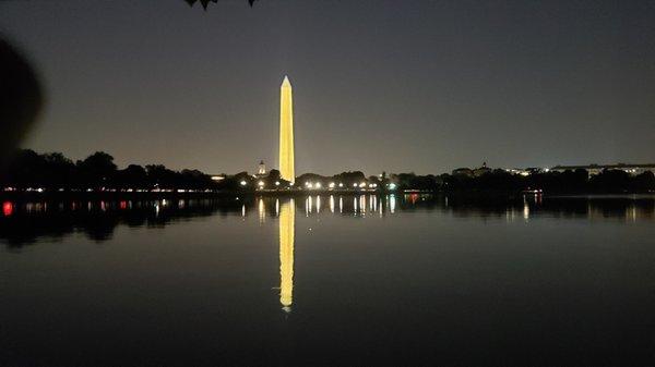 Night view of Washington Monument reflected on Tidal Basin