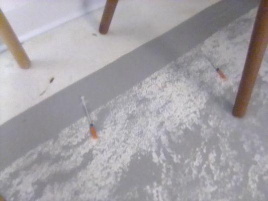 Hypodermic needles found in room @ Hotel 114.