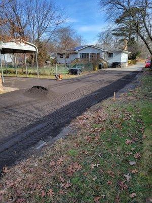 Driveway we recently did in Severn md we widen the driveway and added parking and then graded out with screened asphalt milling's