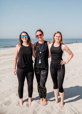 Cape May Beach Yoga instructor Kelsy Wise with guest instructors Danielle and Amanda