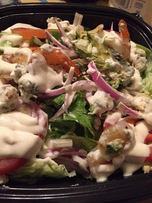 Black and Blue salad with grilled shrimp,onions,chunks if blue cheese, tomatoes and avocado.