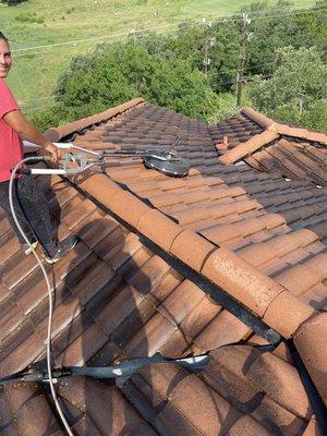 Power washing tile roofs