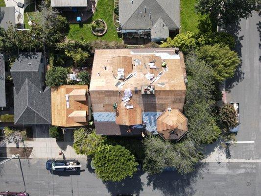 above and beyond crew is installing new plywood on a roof in Los Angeles before inspection is set